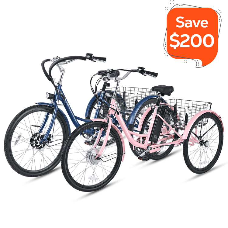 Two electric tricycles, one pink and one blue, with a promotional save $200 label.